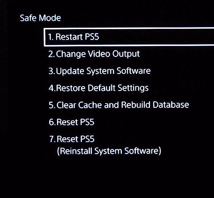 Controller met kabel aangesloten om de PS5 in Safe Mode te bedienen en de database te herbouwen