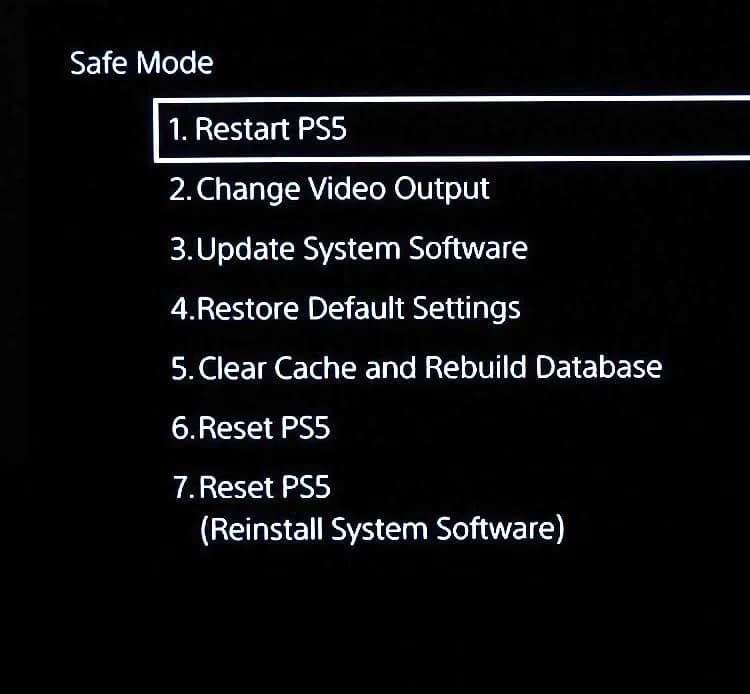 Controller met kabel aangesloten om de PS5 in Safe Mode te bedienen en de database te herbouwen