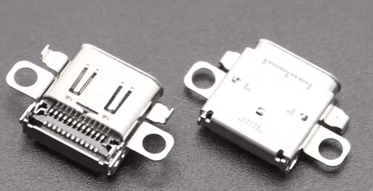 USB-C-oplaadpoort van een Nintendo Switch 2, close-up op de werkbank van FixMyTech